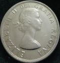 1958 Queen Elizabeth II Commemorative Dollar - obverse cleaned coin.