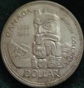 1958 Queen Elizabeth II Commemorative Dollar - reverse uncleaned coin.